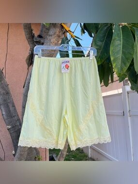 NWT Vintage Deadstock Hers Yellow Slip Shorts with Lace Detailing.